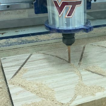CNC router cutting the oak seat segments