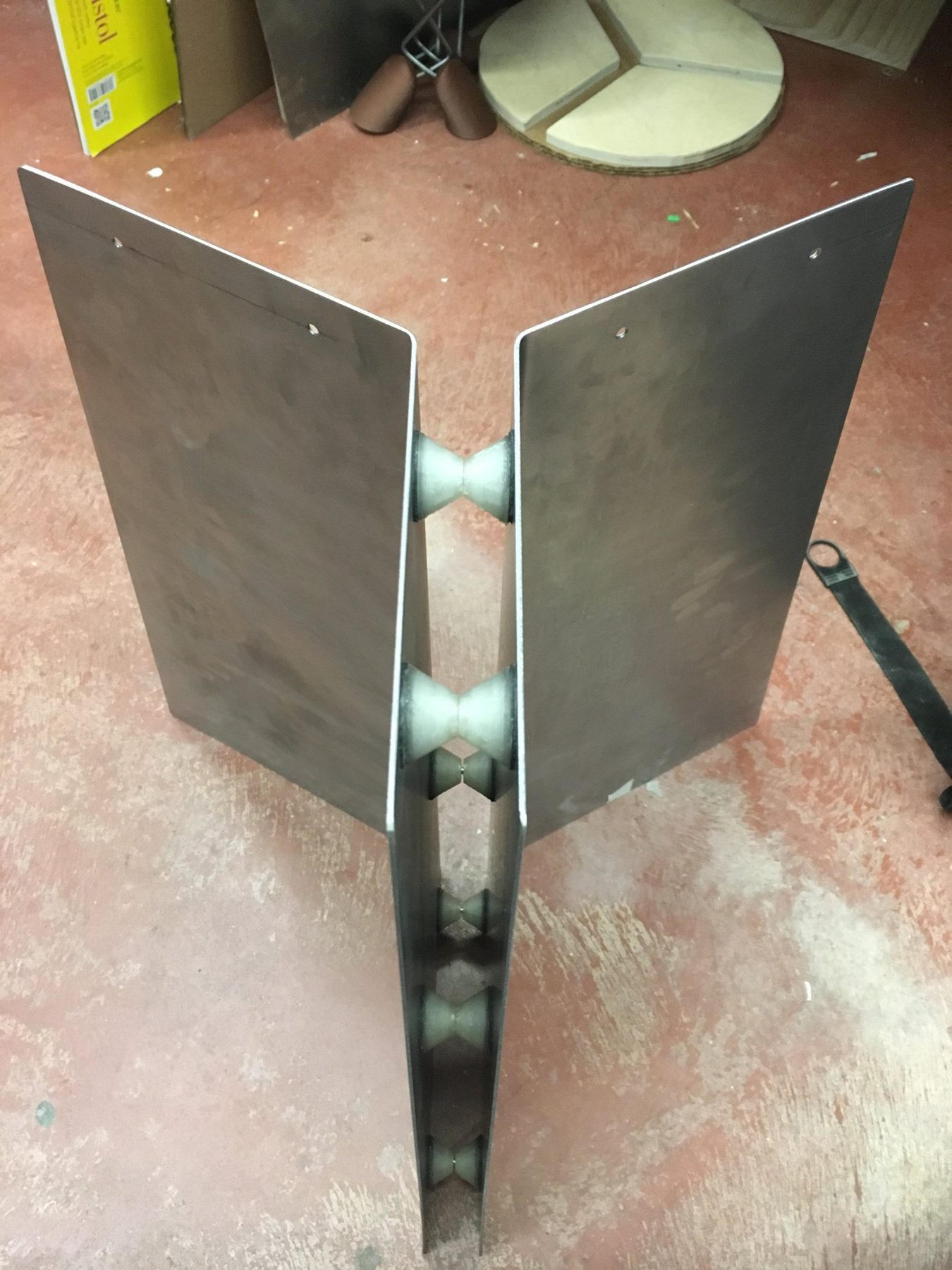 Raw steel base prototype held together by printed spacers