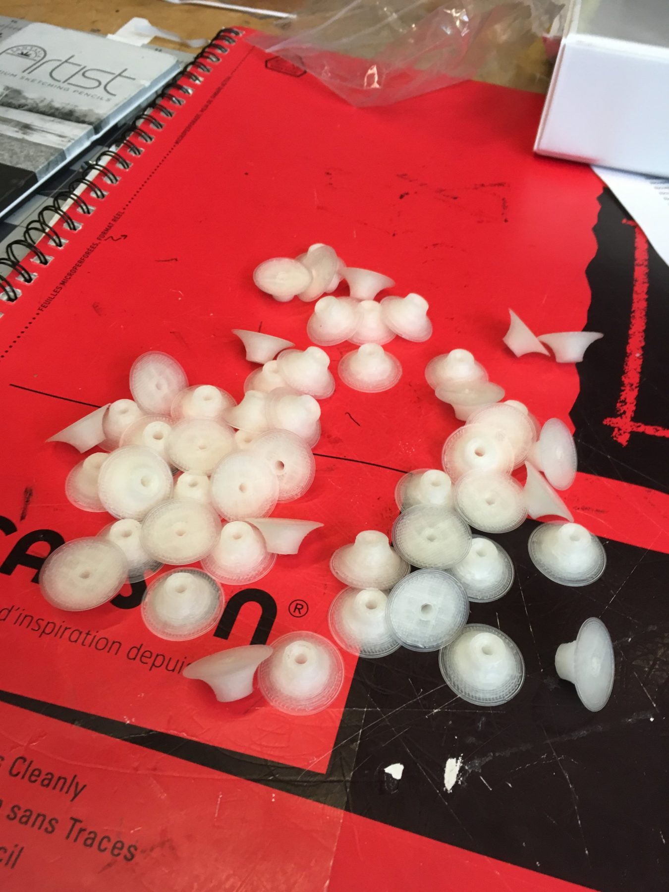 A batch of white test-printed spacers