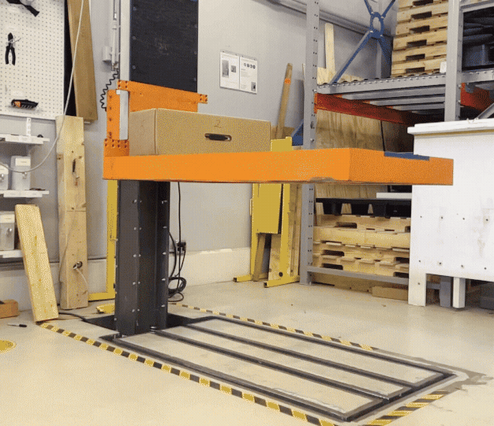 Packaged Optic dropping from the test rig onto the impact floor